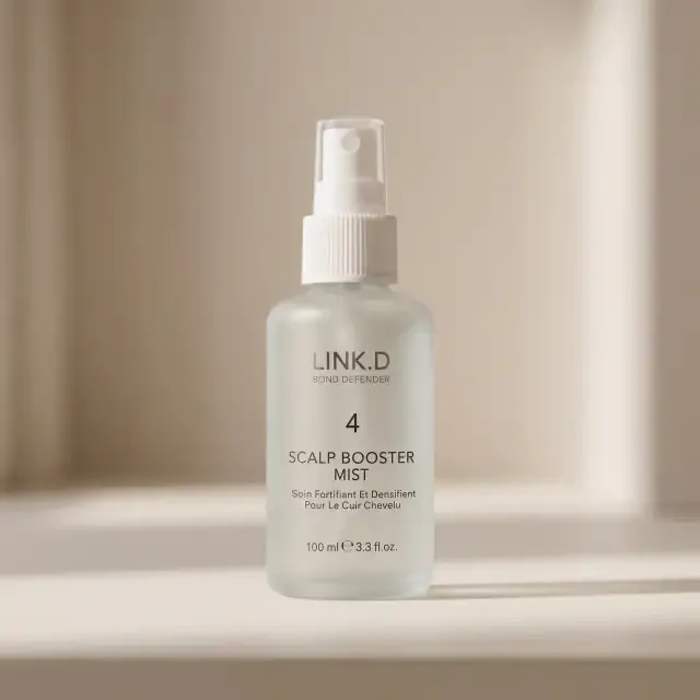 The same bottle from the storefront page of that run, photographed alone on a plain warm studio background.